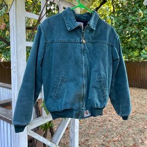Green Carhartt utility jacket. Fits a size small.